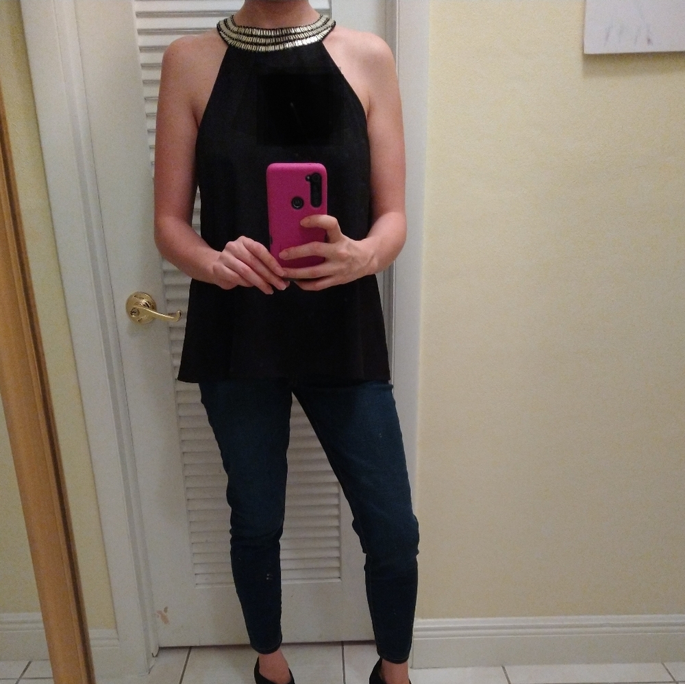 Black sleeveless blouse with attached necklace